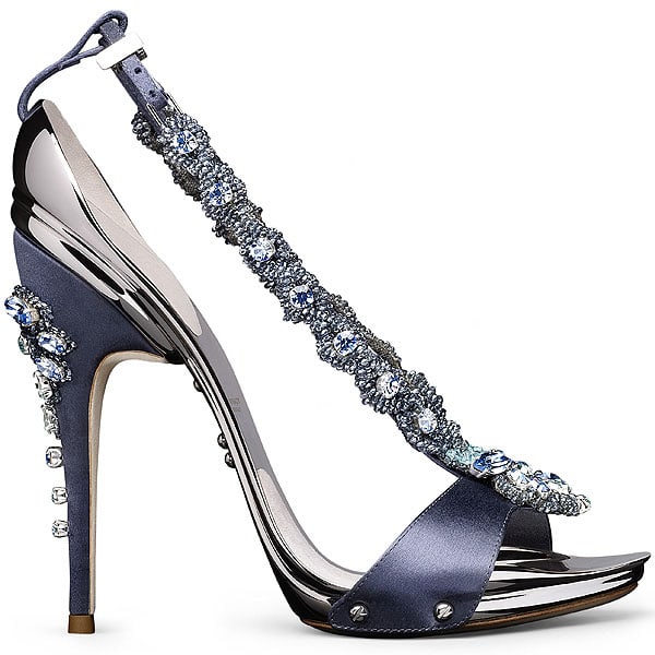 Gianluca Tamburini Paris The Paris sandal by Gianluca Tamburini features a satin base, crystal-studded strap, and polished chrome heel adorned with vertical gem detailing—precision-built for impact
