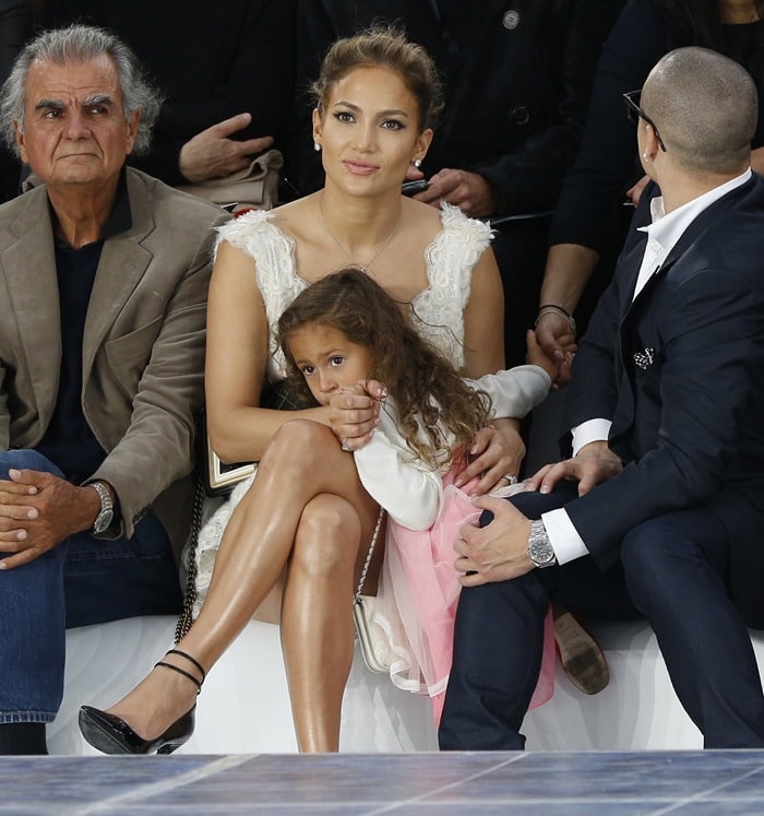 Jennifer Lopez, her daughter, Emme, and Casper Smart sitting in the front row at the Chanel Spring/Summer 2013 fashion presentation in Paris, France, on October 2, 2012