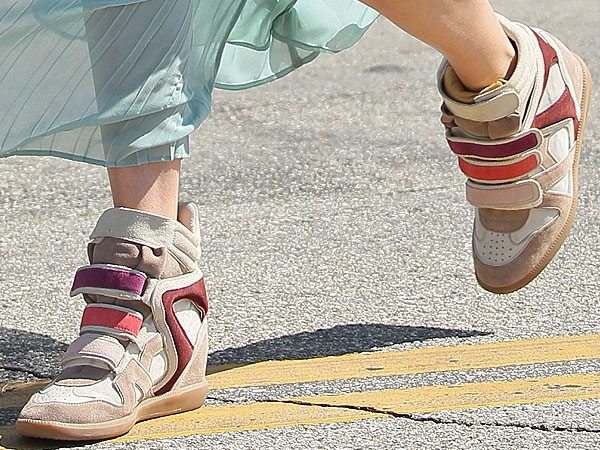 Kate Bosworth Byron and Tracey Salon Kate Bosworth styled her dress with Isabel Marant wedge sneakers