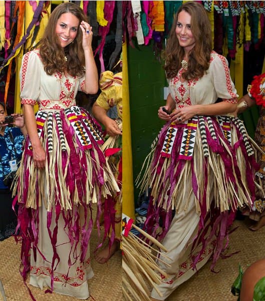 Catherine, Duchess of Cambridge, a.k.a Kate Middleton, in grass skirt, dances with the ladies at the Vaiku Falekaupule at an entertainment program during their visit to the remote Island Nation of Tuvalu on September 18, 2012