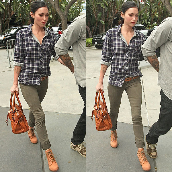 Megan Fox Los Angeles Lakers against Denver Nuggets NBA basketball game Megan Fox holds on to Brian Austin Green as they arrive at the Staples Center for the Los Angeles Lakers against Denver Nuggets NBA basketball game in Los Angeles, CA on April 3, 2011