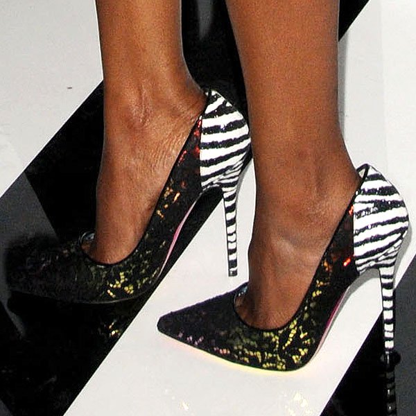Nichole Galicia showcased her feet in bold Jimmy Choo 'Anouk' pumps from the Rob Pruitt collection, featuring eye-catching zebra-striped heels and vibrant multicolor detailing