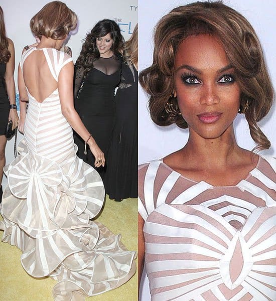 Tyra Banks at The Flawsome Ball A radiant Tyra Banks steals the spotlight at The Flawsome Ball, her Francis Libiran gown's illusion stripes creating a mesmerizing effect among the glamorous attendees