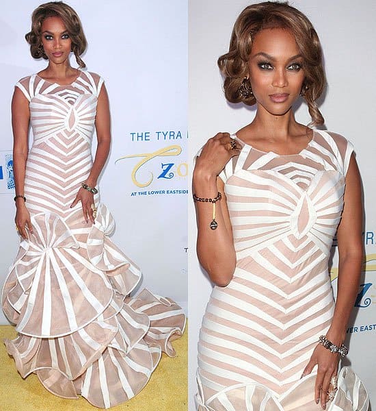 Tyra Banks at The Flawsome Ball Tyra Banks elegantly arrives at The Flawsome Ball, showcasing a breathtaking white and nude mermaid gown designed by Francis Libiran, in New York City on October 18, 2012