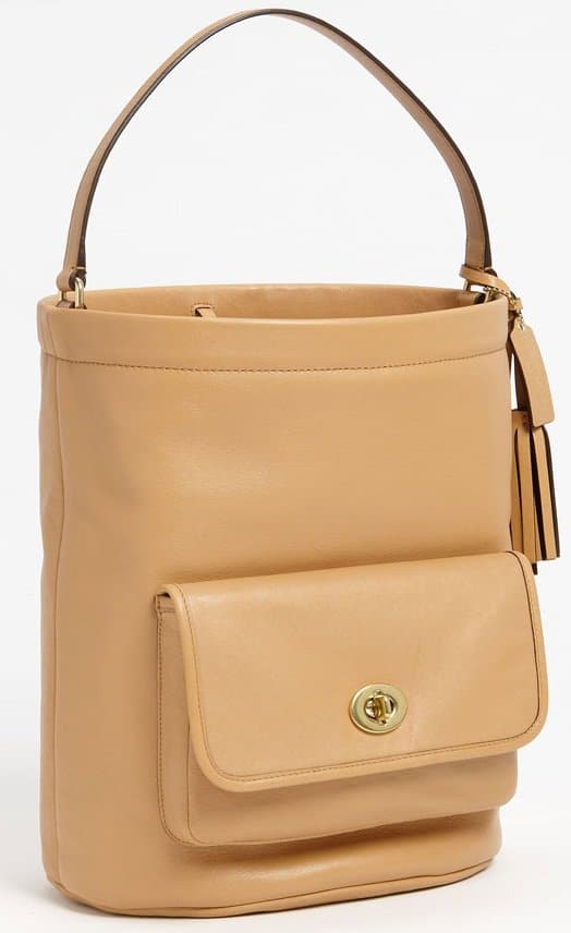 coach legacy archival bucket Classically clean lines shape a spacious bucket bag crafted from silky, glove-tanned leather