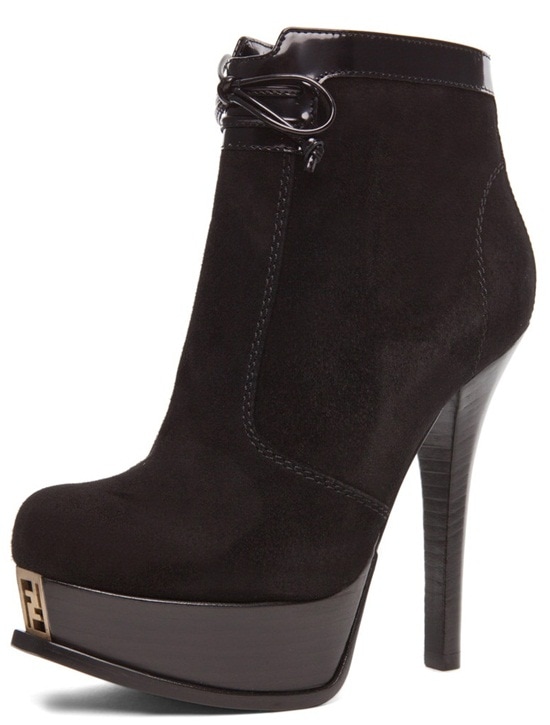 Fendi 'Fendista' Bootie in Black Suede Fendi “Fendista” Bootie in Black Suede — A luxurious ankle boot featuring smooth suede, glossy patent trim, and Fendi’s signature FF metal logo accent on a sculpted 1-inch platform and 5-inch stacked heel