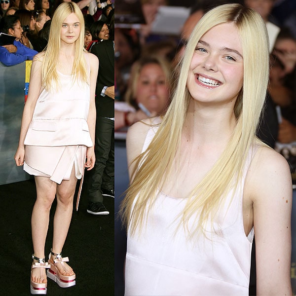 Elle Fanning 'The Twilight Saga Breaking Dawn - Part 2' premiere Elle Fanning posing for the cameras at the premiere of The Twilight Saga: Breaking Dawn — Part 2 at Nokia Theatre L.A. Live in Los Angeles, California on November 12, 2012