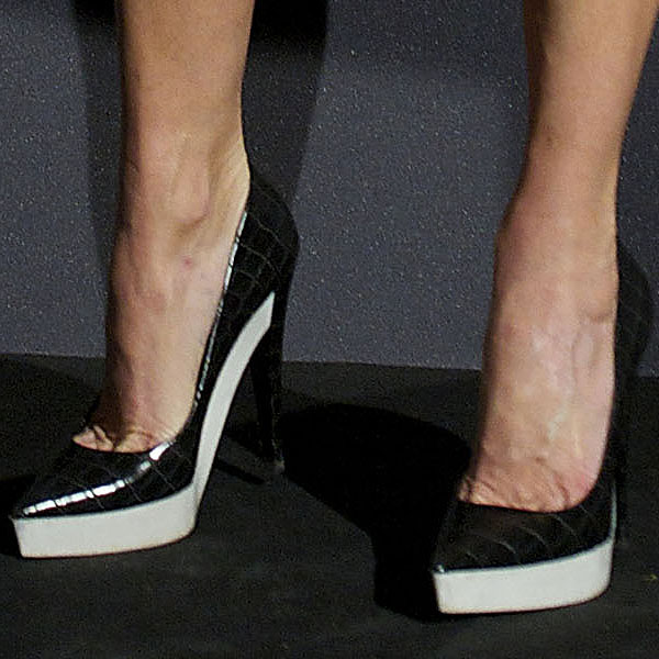 Stella McCartney in Stella McCartney faux crocodile platform pump A closer look at Stella McCartney's footwear reveals the elegance of the faux crocodile platform pumps