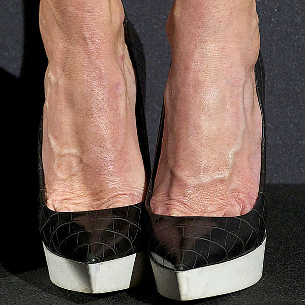 Stella McCartney in Stella McCartney faux crocodile platform pump Complementing her exquisite attire, Stella McCartney's choice of footwear - the faux crocodile platform pumps - adds a bold statement