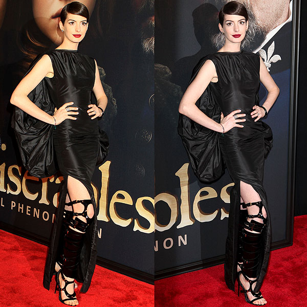 Anne Hathaway in Tom Ford Spring 2013 RTW boot sandals Anne Hathaway made a spellbinding appearance at the 'Les Misérables' premiere, draped in a dramatic black Tom Ford column gown complete with a voluminous cape