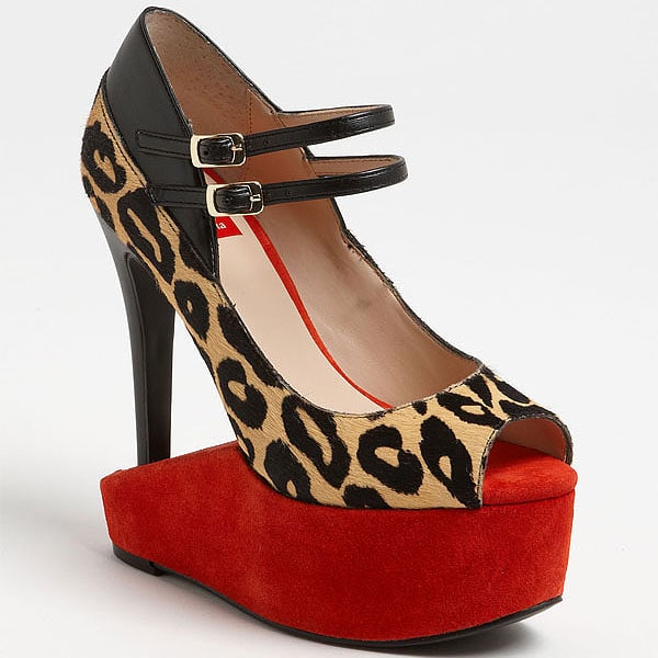 A sharp stiletto heel paired with a chunky red suede platform and leopard-print Mary Jane straps, this DV8 by Dolce Vita design is a daring clash of textures and proportions