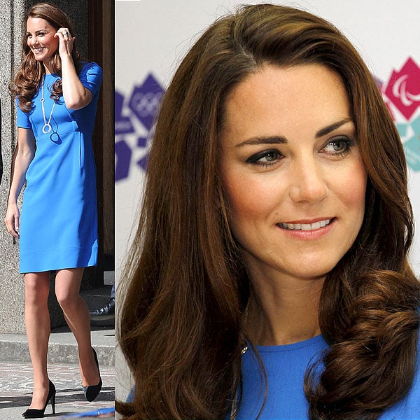 Kate Middleton National Portrait Gallery Kate Middleton brightens up in a cobalt blue Stella McCartney shift dress, accessorized with a simple pendant necklace and black pointed-toe pumps