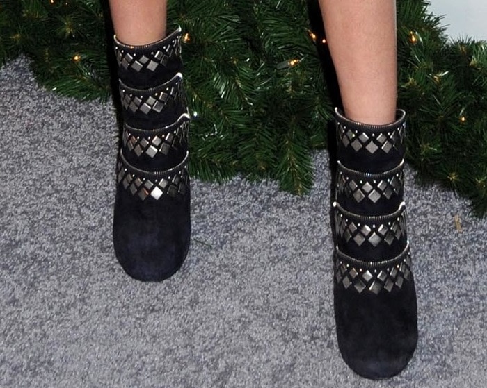Kendall Jenner’s Azzedine Alaïa studded suede ankle boots—crafted in Italy with intricate latticework and luxe materials—show why designer footwear comes at a premium