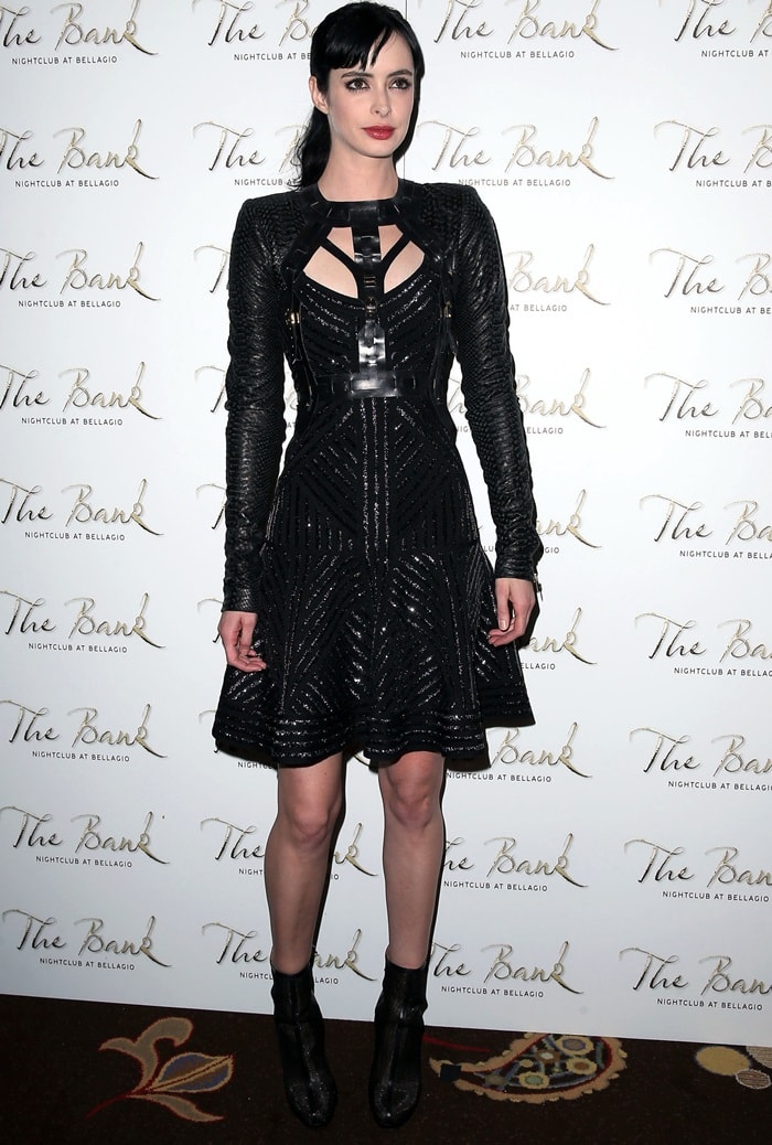 Krysten Ritter pairs a bold Hervé Léger dress with edgy Rachel Zoe "Maddy" mesh ankle booties for her 31st birthday at The Bank Nightclub in Las Vegas