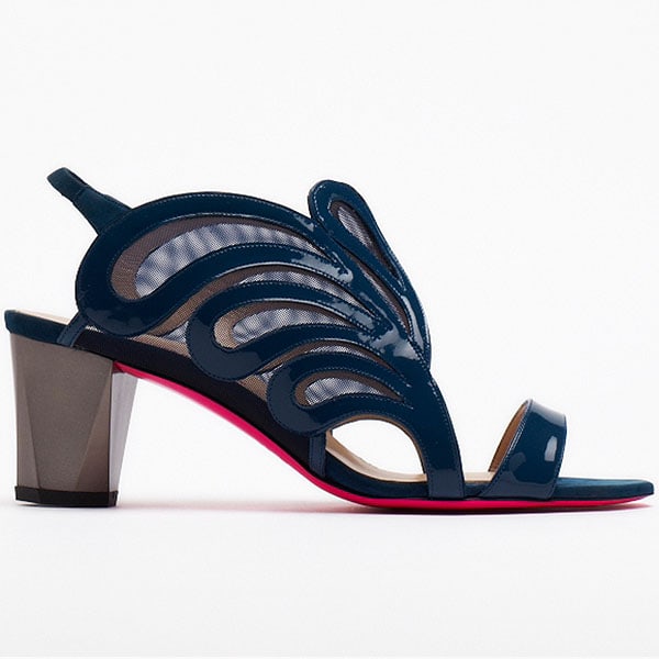 Matthew Williamson Spring 2013 shoes This navy sandal pairs glossy, wave-like overlays with a block heel, balancing fluid ornamentation against a stable, wearable base