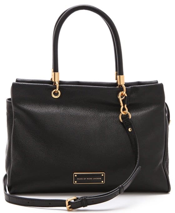 marc by marc jacobs too hot to handle tote Brushed gold hardware sets off the finely grained Italian leather of a roll-handle tote cut with a clean, crisp topline