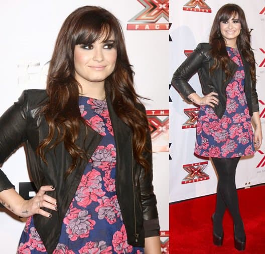 demi lovato x factor viewing party dec 6 Demi Lovato showcases her new brunette look with side-swept bangs at an X Factor viewing party