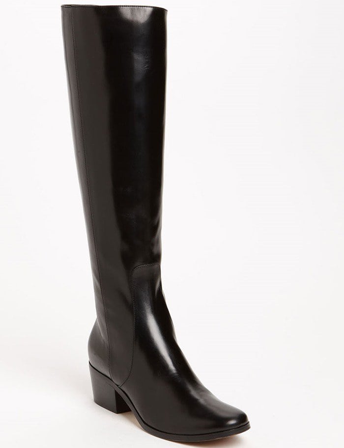 Jimmy Choo “Bili” Fitted Low-Heel Boots in Smooth Leather, originally retailing for $1,095 — a sleek, knee-high silhouette with a low stacked heel, almond toe, and streamlined shaft for a clean, leg-lengthening finish