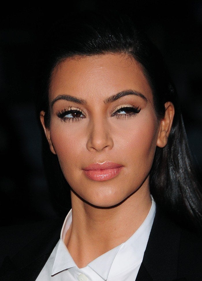 Kim Kardashian captivates with her mesmerizing brown eyes, a signature feature that enhances her timeless beauty
