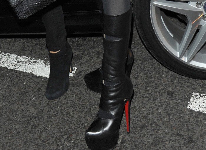 Lindsay Lohan stuns in striking red-soled platform "Bandita" boots