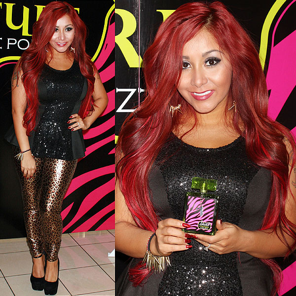 Snooki dazzles at the launch of her 'Snooki Couture' fragrance and 'Snooki Nails' beauty line at Perfumania in Las Vegas, pairing sequins with leopard-print leggings
