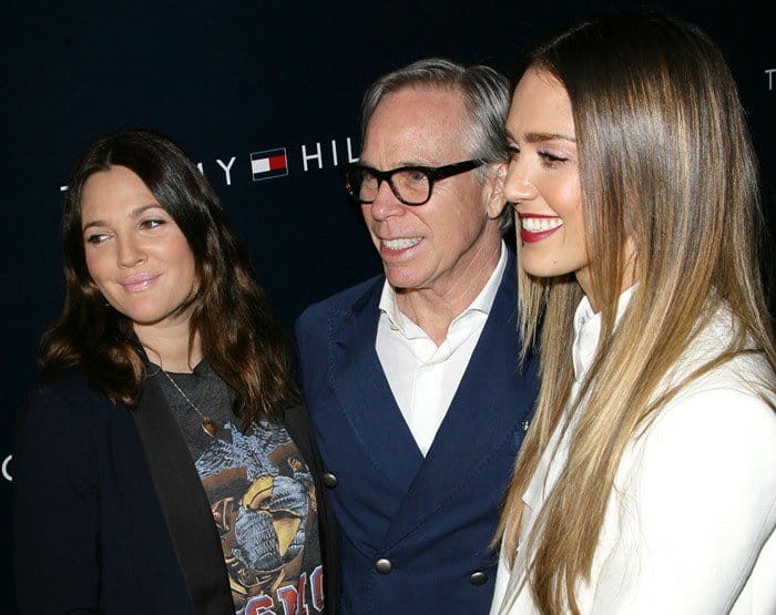 Drew Barrymore, Tommy Hilfiger, and Jessica Alba attend a party to celebrate the opening of the new Tommy Hilfiger West Coast Flagship store on Robertson Boulevard on February 13, 2013