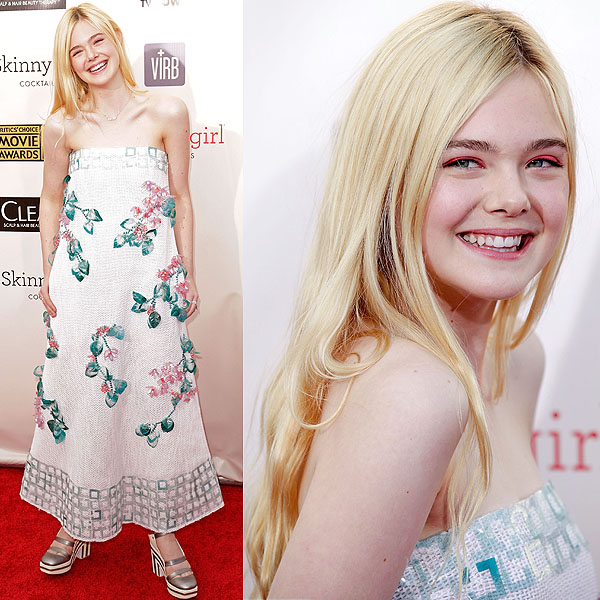 Elle Fanning radiates youthful elegance in a strapless floral A-line dress from Chanel's Spring 2013 collection, paired with bold striped platform heels, at the 18th Annual Critics' Choice Movie Awards held at Barker Hangar in Santa Monica, California, on January 10, 2013
