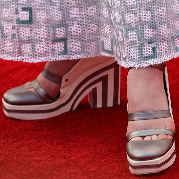 A closer look at Elle Fanning’s bold choice of footwear: Chanel’s Spring 2013 striped platform heels, featuring a striking closed-toe design and geometric pattern