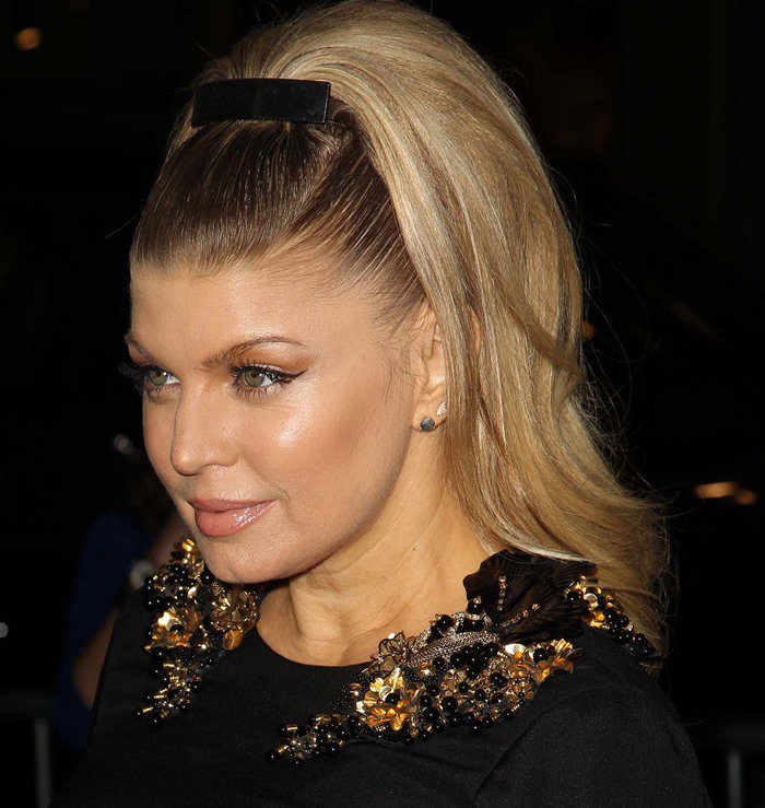 Fergie dazzles in a jeweled Gucci dress with an elegant high ponytail