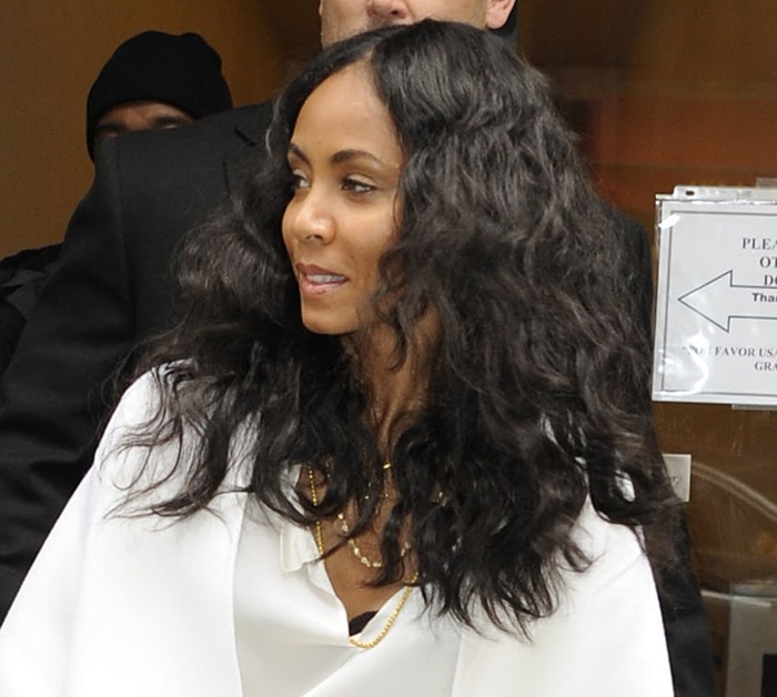 Jada Pinkett Smith showcases effortless New York street style with soft waves, layered gold jewelry, and a relaxed ivory blouse