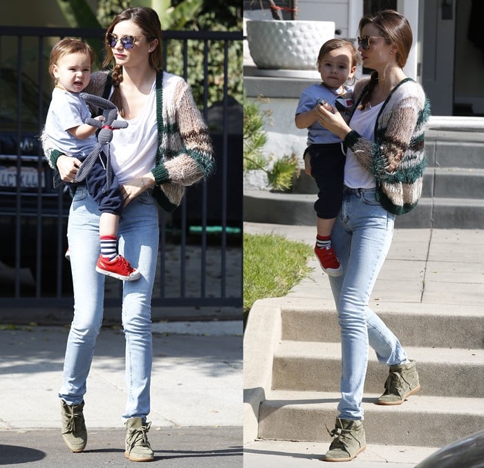 Miranda Kerr steps out in skinny jeans and olive suede Isabel Marant wedge sneakers while carrying Flynn Bloom during an afternoon outing in Los Feliz