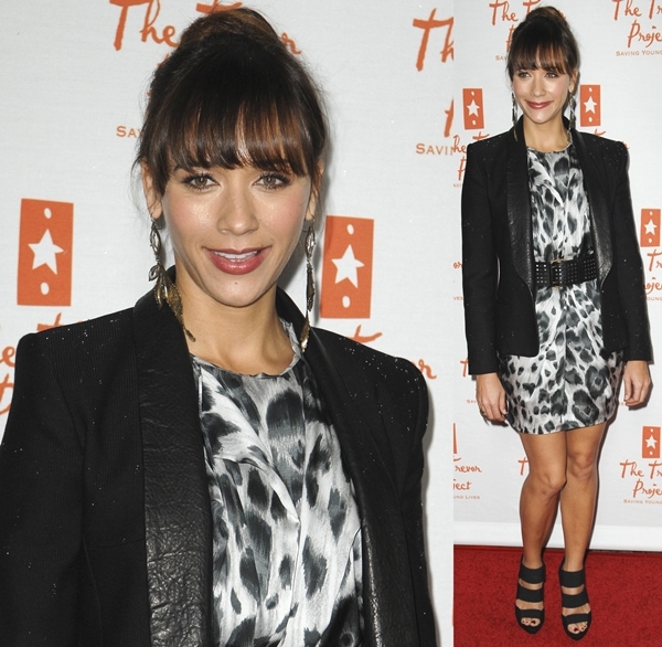Rashida Jones exudes sophistication in a black-and-white animal print dress paired with a structured black blazer and strappy black heels, adding an edgy flair at the Trevor Live event