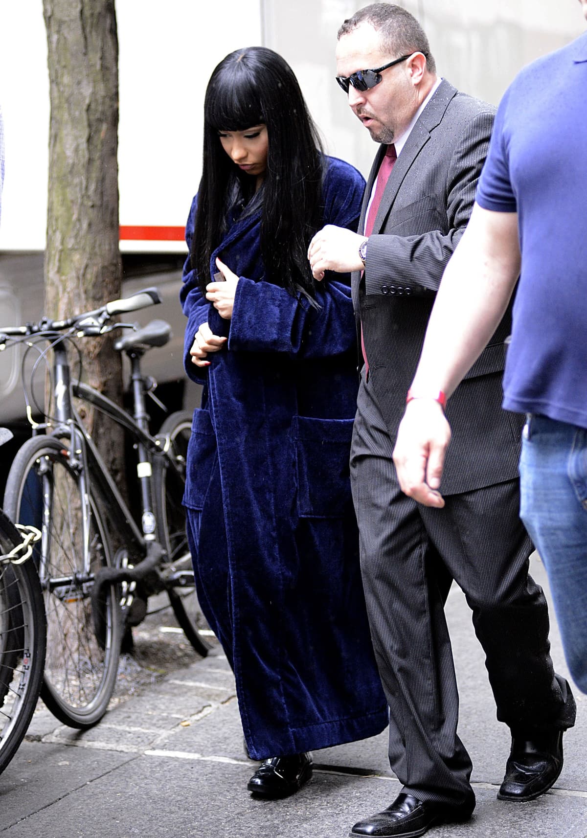 Nicki Minaj stays warm in a blue robe on the set of The Other Woman during filming in New York City