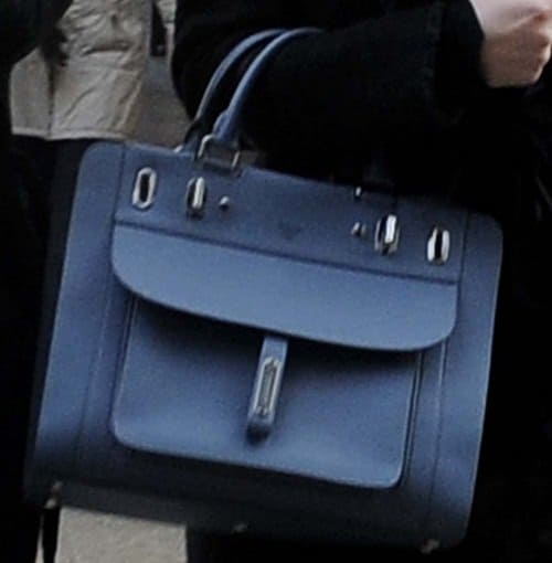 Bar Refaeli showcases her exquisite taste with a new structured blue handbag from Fontana Milano 1915, embodying Italian craftsmanship and luxury