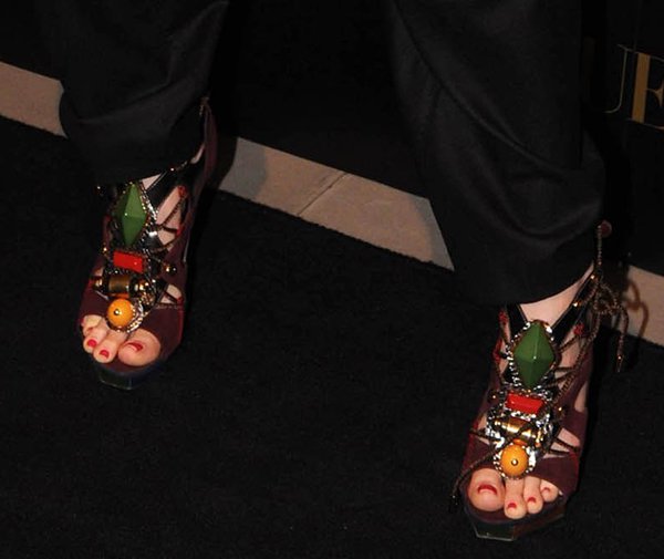 Alice Eve put her sexy toes on display in embellished cage sandals