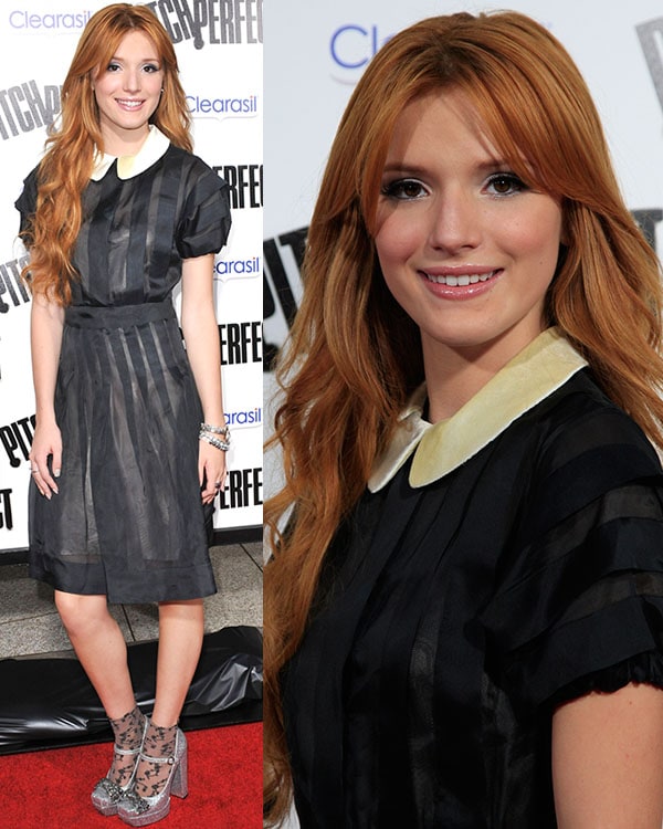 Bella Thorne channels a retro vibe in a sheer black dress with a contrasting collar, paired with glittery platform heels at the Pitch Perfect premiere