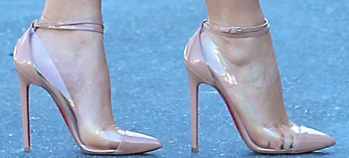 Kim Kardashian's feet in "Un Bout" pumps from Christian Louboutin elongating effect of skin colored nude heels
