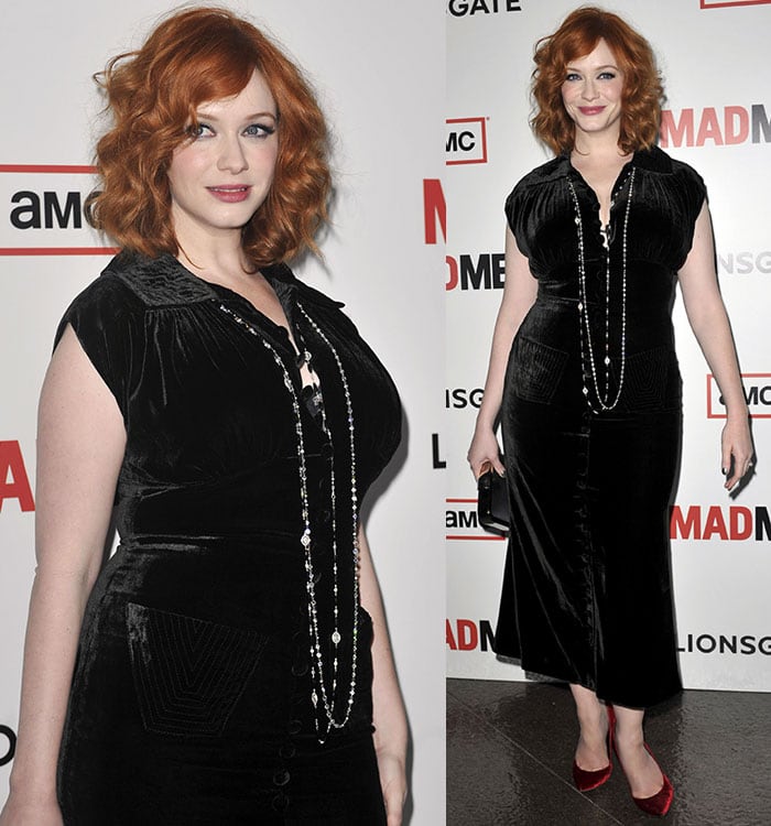 Christina Hendricks goes head-to-toe velvet in a black L’Wren Scott Fall 2012 dress paired with a black satin L.K. Bennett "Amelia" clutch and red velvet Giuseppe Zanotti pumps