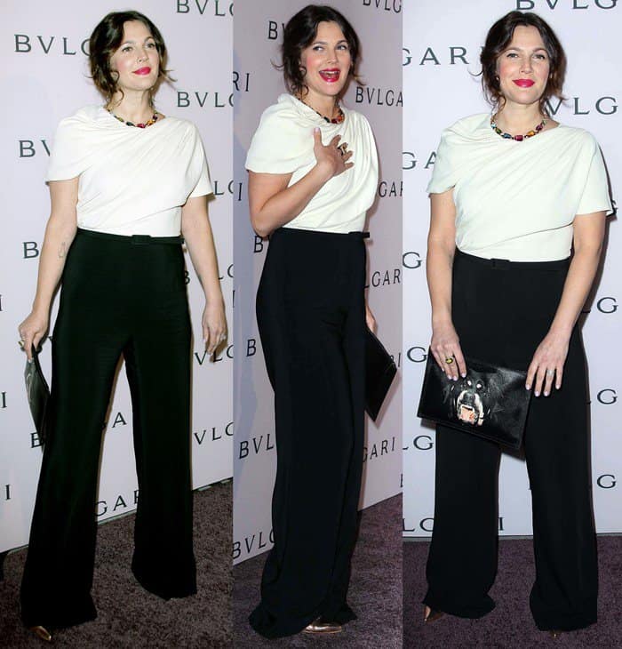 Drew Barrymore paired a softly draped Max Mara jumpsuit with metallic heels and a Givenchy Rottweiler clutch at BVLGARI’s Beverly Hills celebration honoring Elizabeth Taylor’s jewelry collection