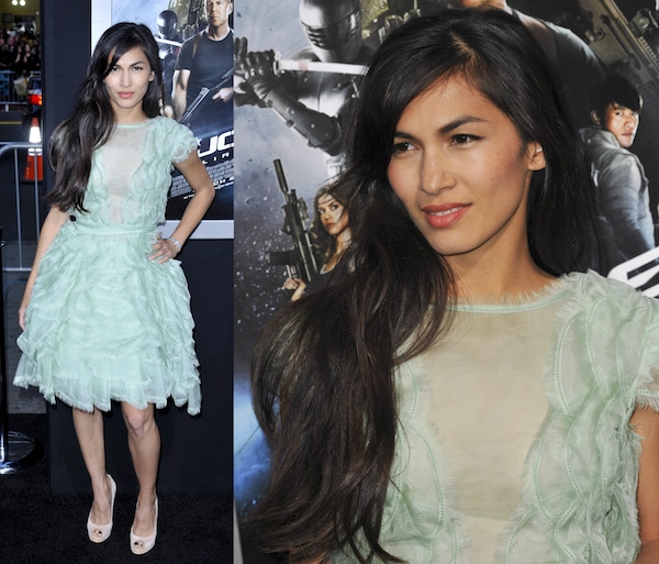 Elodie Yung exudes ethereal elegance in a pastel ruffled dress, effortlessly styled with nude peep-toe pumps and soft, flowing waves for a delicate yet sophisticated red carpet look