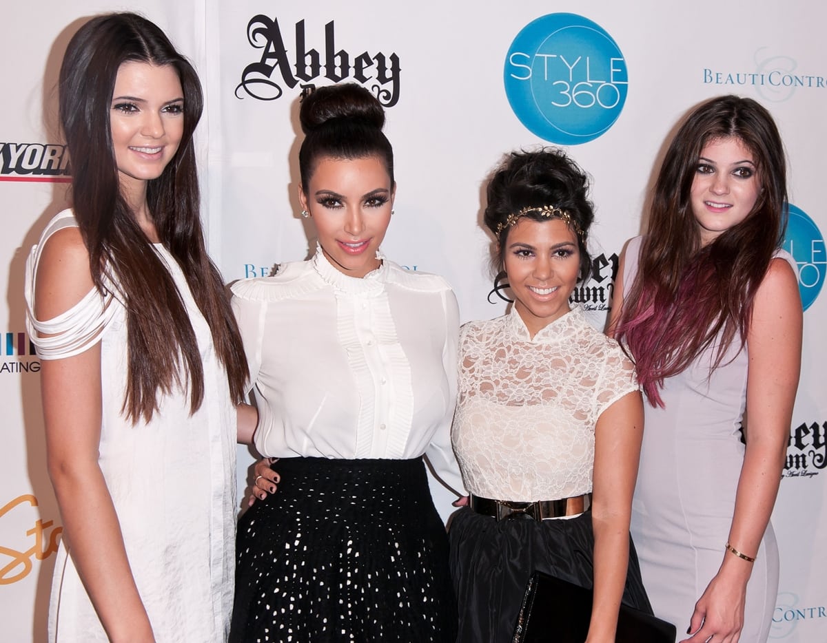 The Kardashian sisters, from left to right: Kendall Jenner, Kim Kardashian, Kourtney Kardashian, and Kylie Jenner, showcase their distinct styles at a fashion event