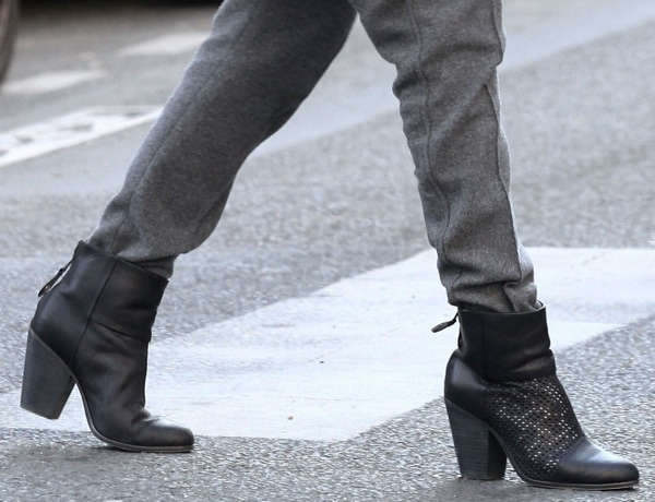 Jessica Alba steps out in Paris wearing Rag Bone’s Classic “Newbury” ankle booties, styled here in smooth black leather with perforated panels and the brand’s signature stacked block heel