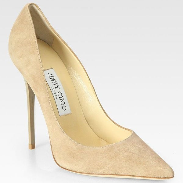 Jimmy Choo “Anouk” suede pumps feature a sleek pointed toe and a towering stiletto heel, a signature silhouette that helps elongate the leg line — originally retailing for $595
