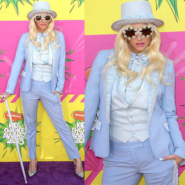 Kesha in a powder blue tuxedo with a top hat and cane at the 2013 Kids’ Choice Awards