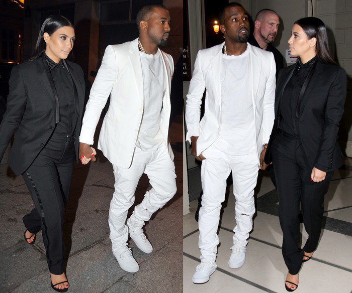 Kim Kardashian steps out in Paris with Kanye West wearing a sharply tailored black ensemble featuring Givenchy cady trousers, finished with minimalist Saint Laurent “Jane” sandals that add a sleek, barely-there contrast to the menswear-inspired look