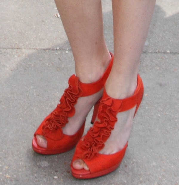 Lucy Dixon shows off her sexy feet in red suede ruffle sandals