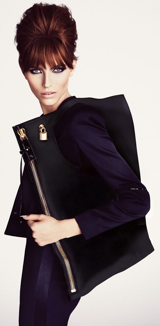 This bag can be carried with cutout top handle or folded over and held in hand