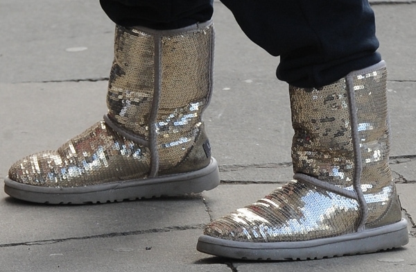 Roxanne Pallett adds a bold twist to loungewear by pairing her navy onesie with eye-catching metallic sequined UGG boots