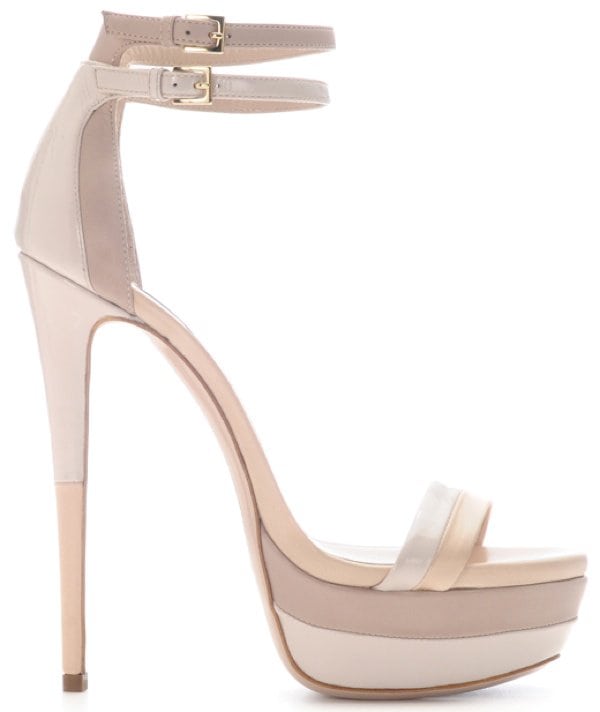 A sculptural blend of cream and taupe, the Ruthie Davis ‘West Palm’ platform sandal features double ankle straps, a sleek tapered heel, and a leg-lengthening minimalist silhouette