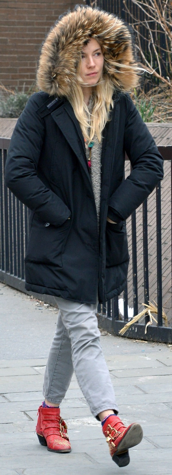 Sienna Miller could have worn a shorter pair of socks that didn’t show as opposed to these folded purple monstrosities